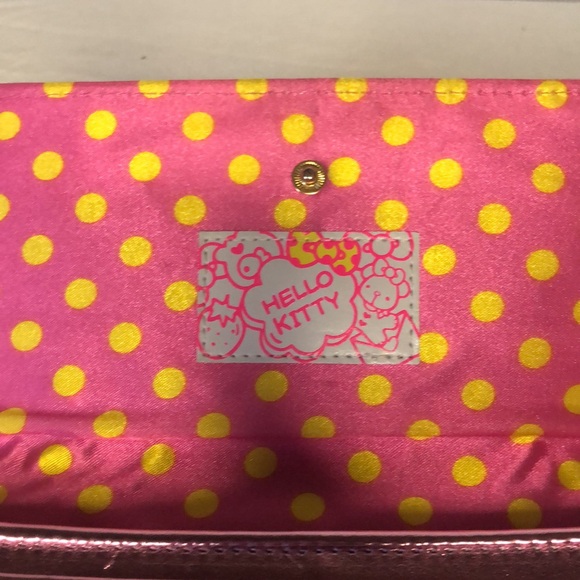 HELLO KITTY metallic pink wallet. Holds up to 16 cards. Polka dot lining inside. - Picture 11 of 16